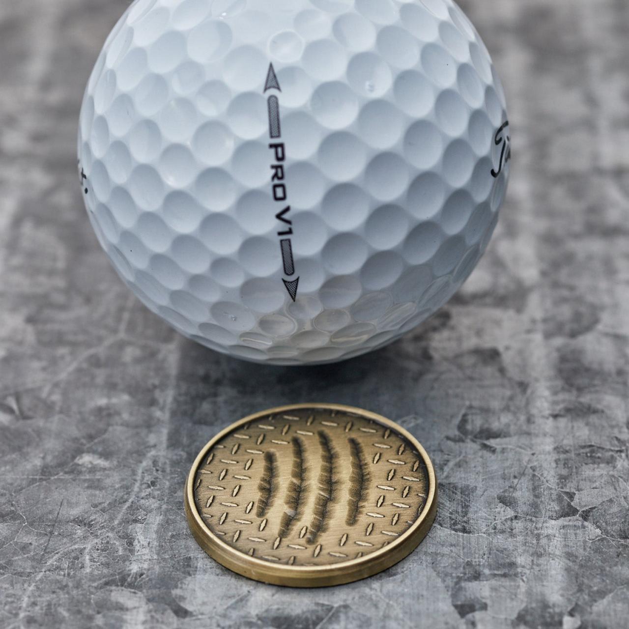 Magnetic golf ball marker