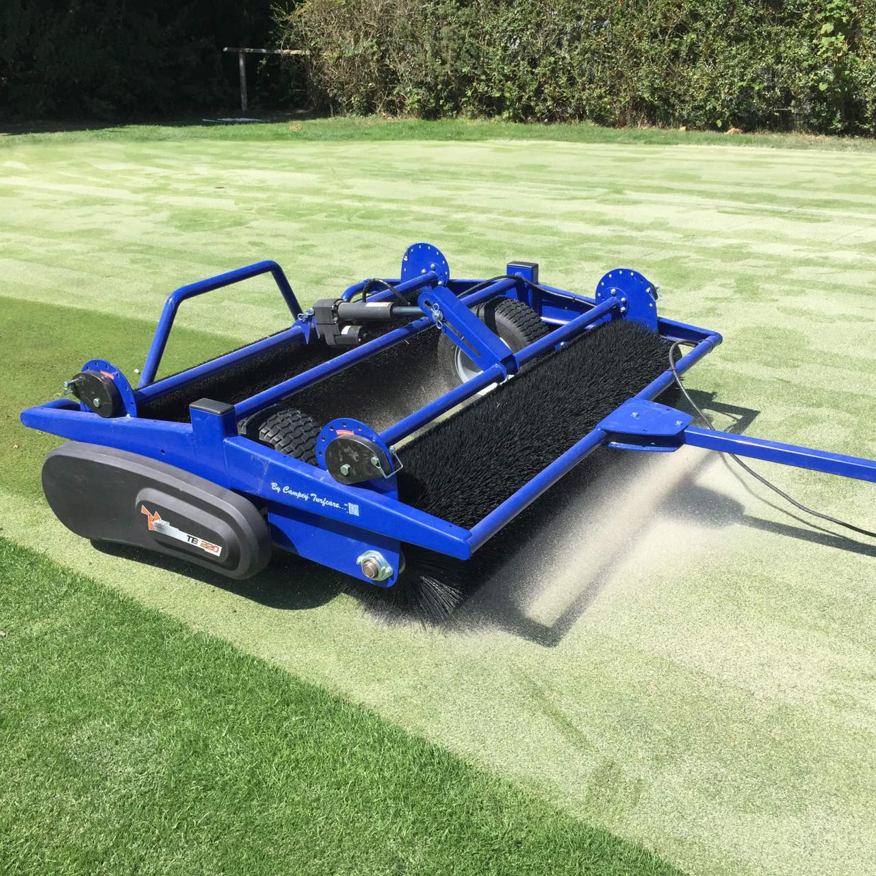 Turf brush machine